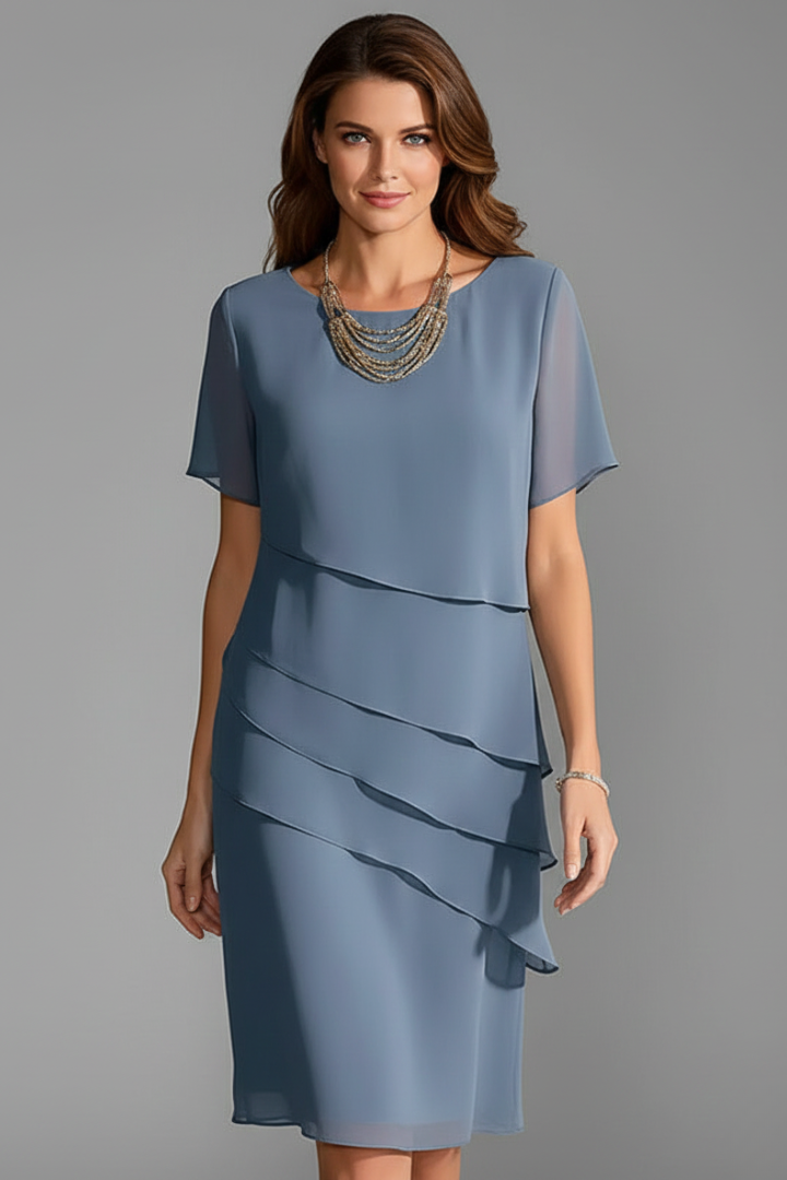 Women's blue short sleeve dress with layered front panel