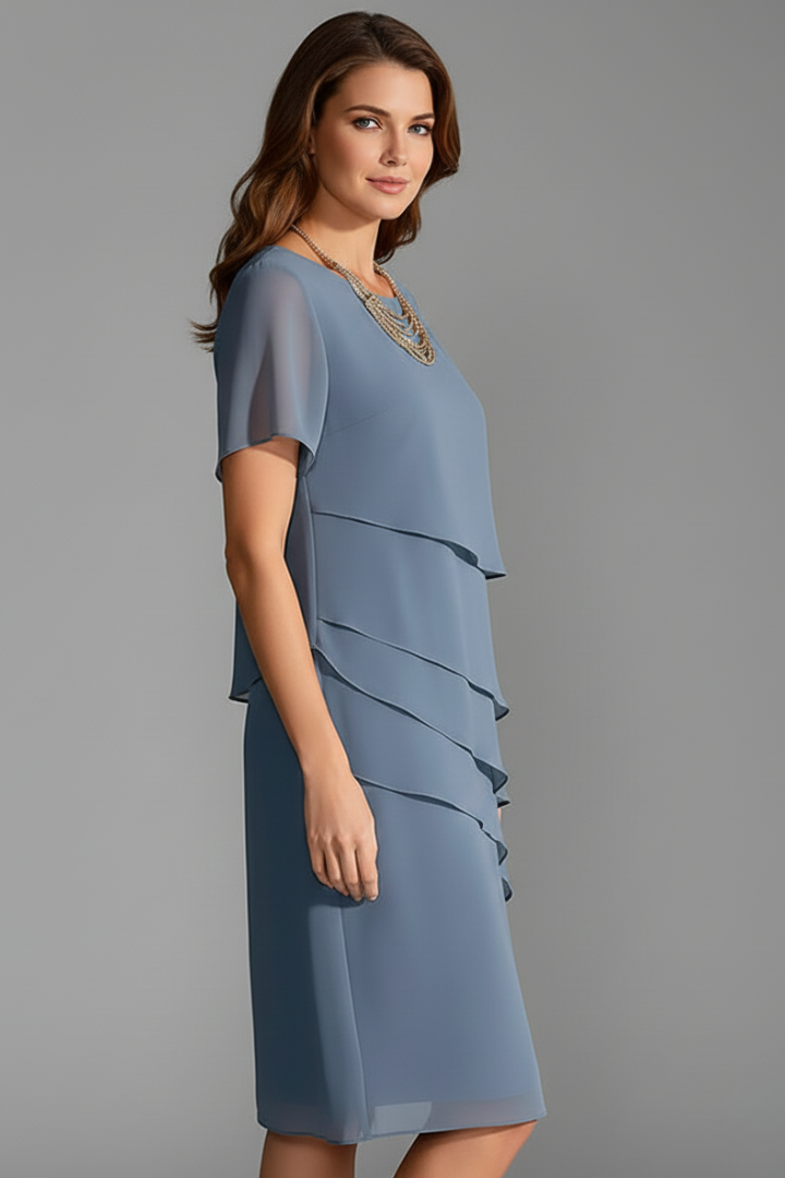 Women's blue short sleeve dress with layered front panel