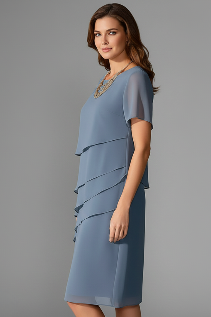 Women's blue short sleeve dress with layered front panel