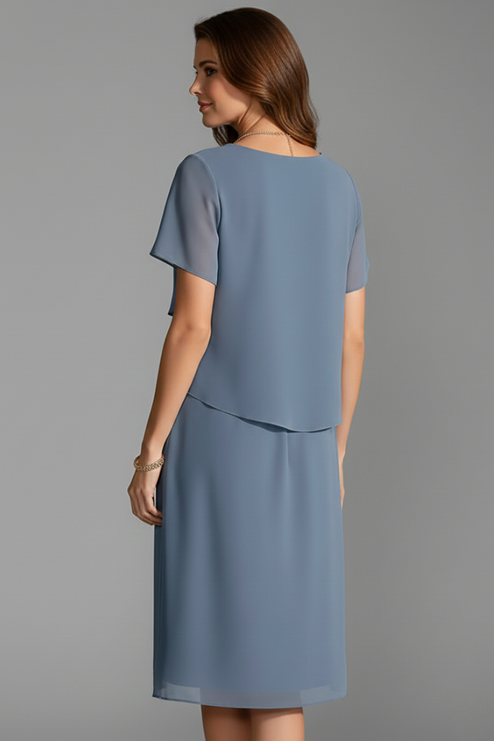 Women's blue short sleeve dress with layered front panel