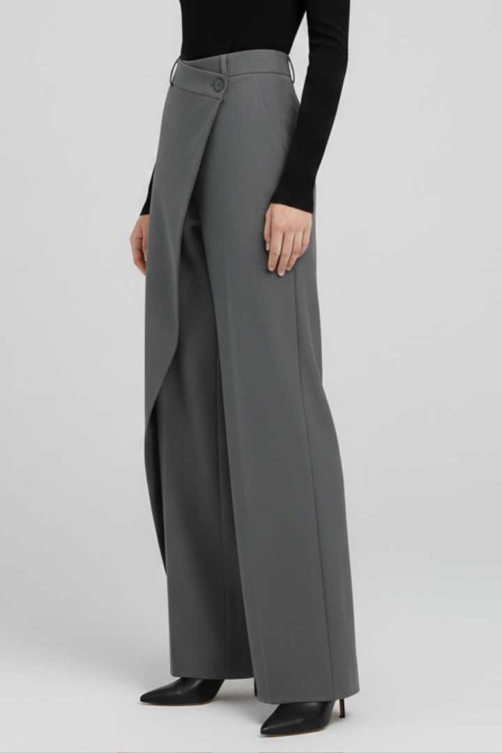 Grey straight-leg trousers featuring a tailored asymmetric front panel design