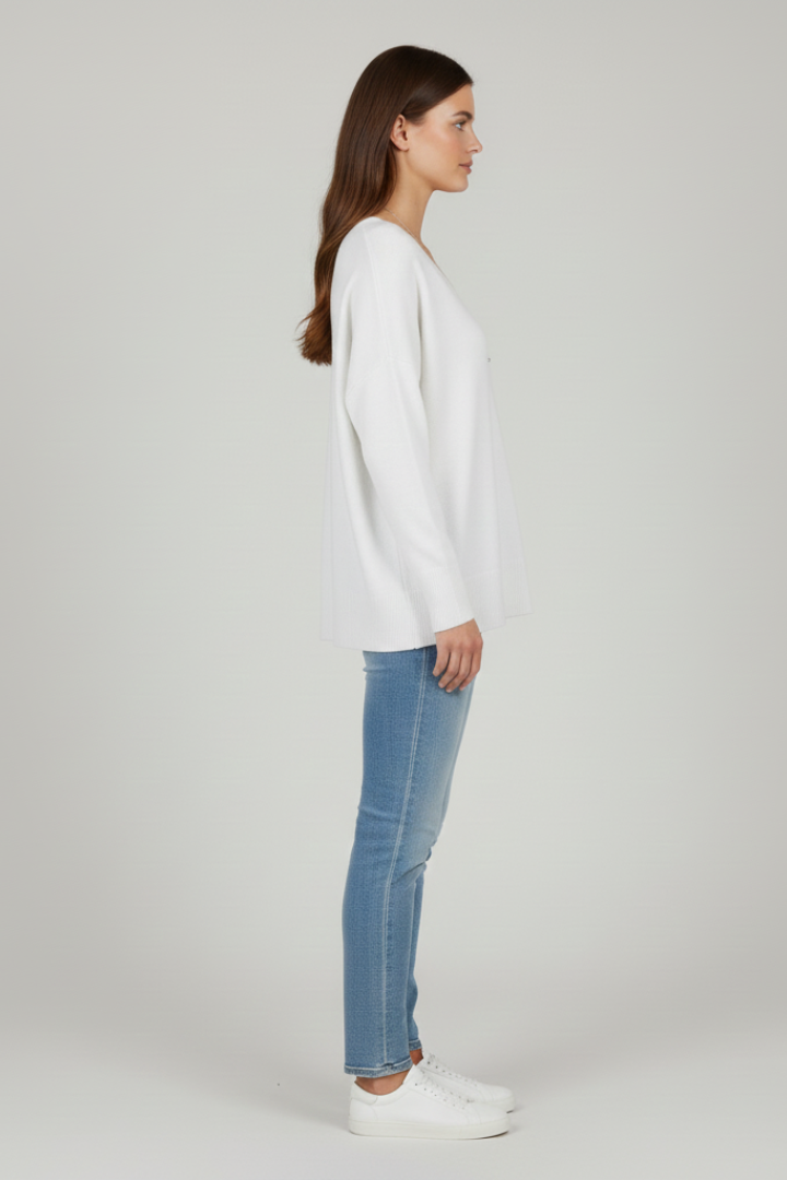 Women's white V-neck jumper with dropped shoulders and a straight hem