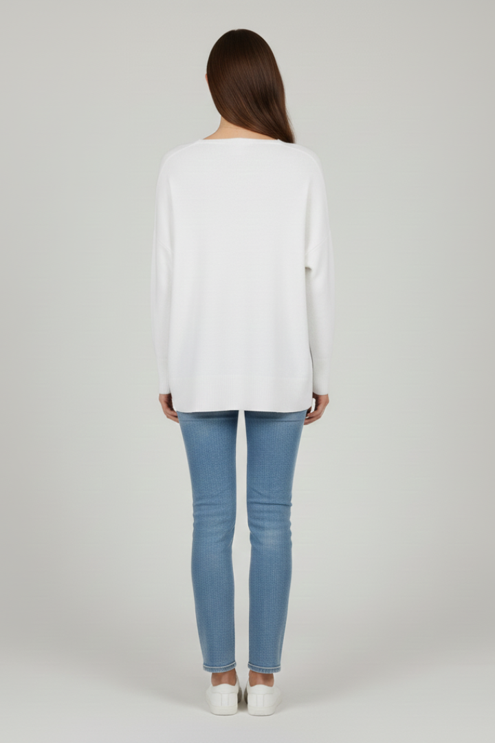 Women's white V-neck jumper with dropped shoulders and a straight hem